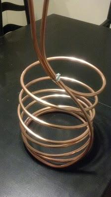Clamping the top of the copper tubes.