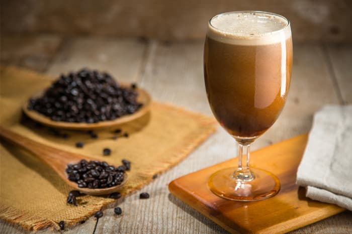 A goblet of freshly poured nitro coffee beer.