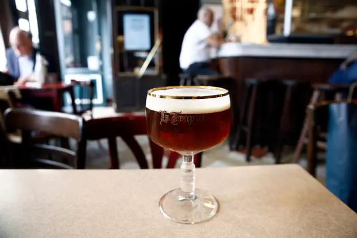 A goblet of Trappist beer in a pub.