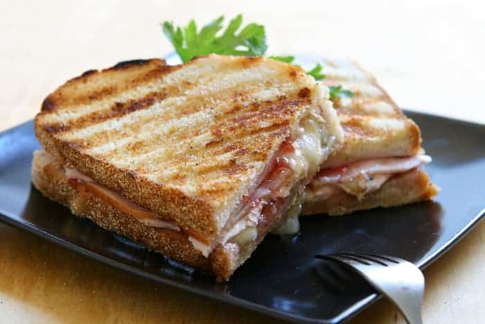 A turkey and brie cheese grilled panini.