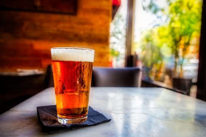 A glass of lager beer.