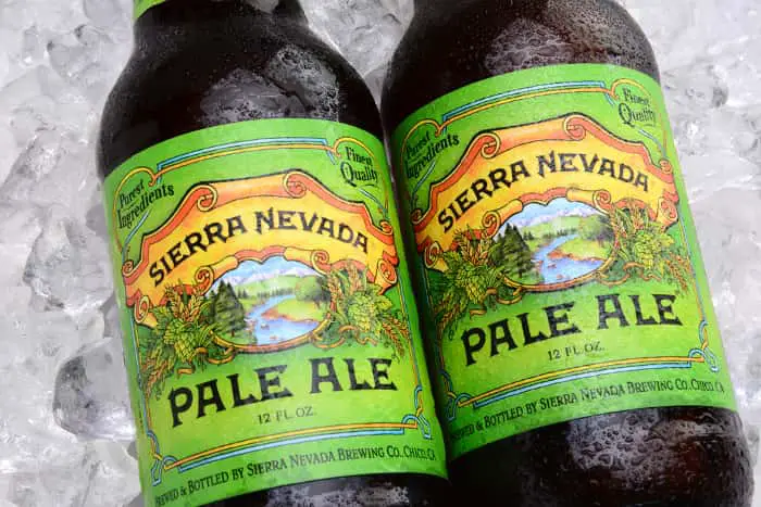 Two bottles of Sierra Nevada Pale Ale on ice, a popular American Pale Ale beer.