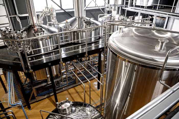 The inside of a brewery production room.