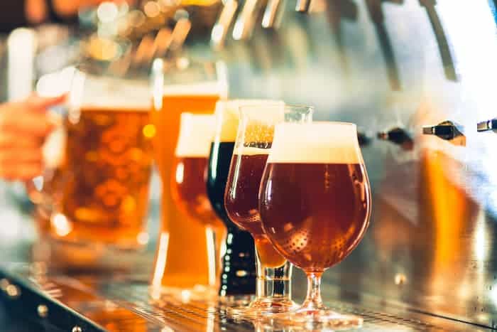Various craft beers in glasses.