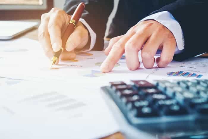 Man going over financial reports.