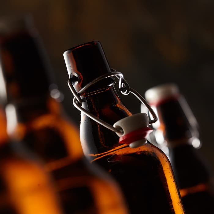 Closeup of craft beer bottles.