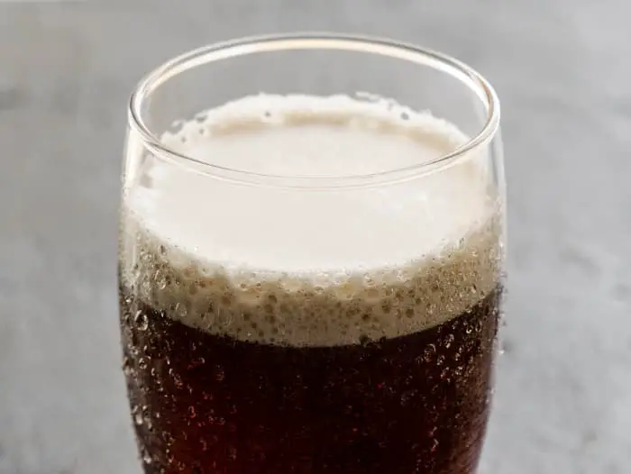 Closeup of a glass of Irish red beer.